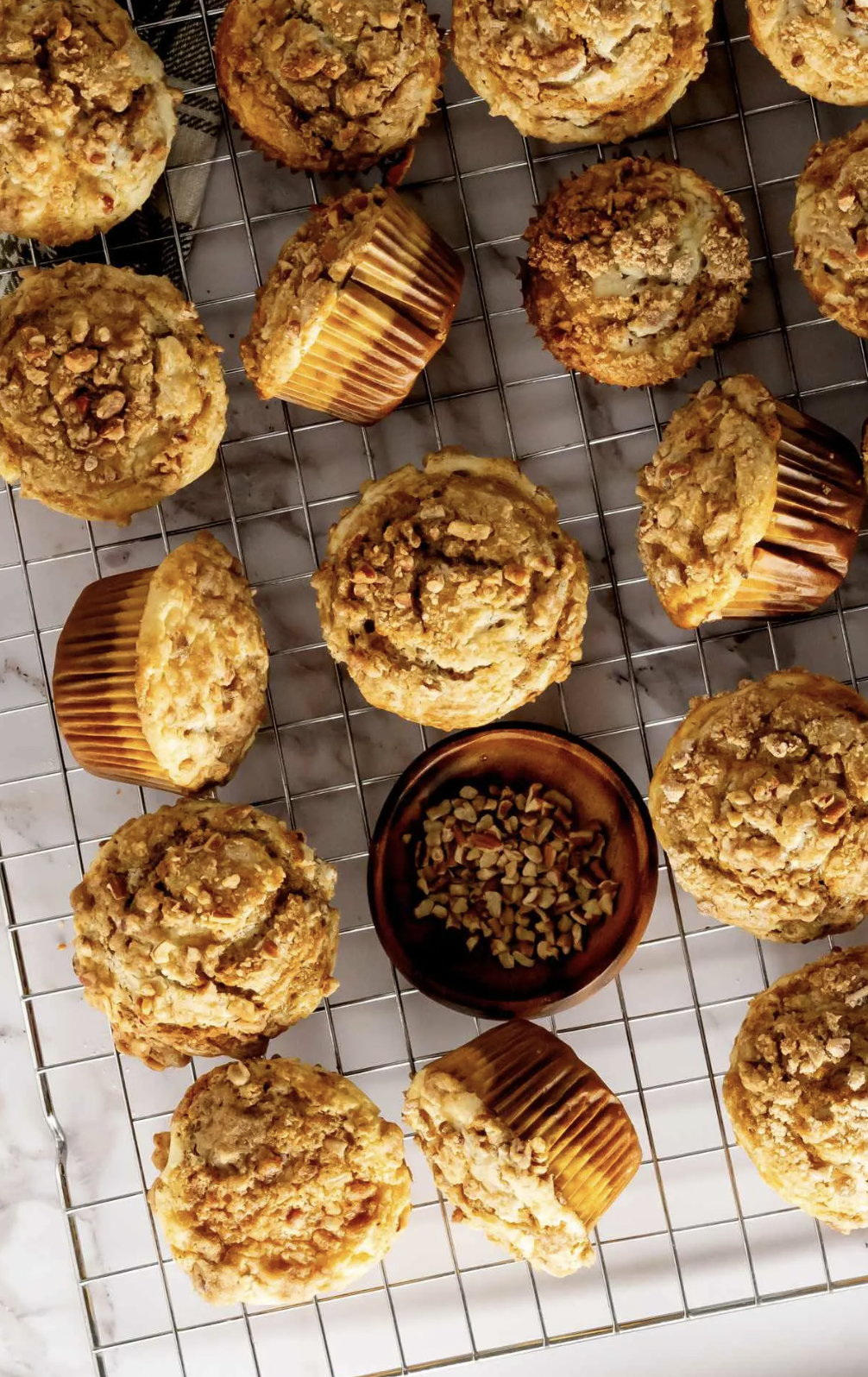 Pumpkin Cheesecake Swirl Muffins with Pecan Crumble